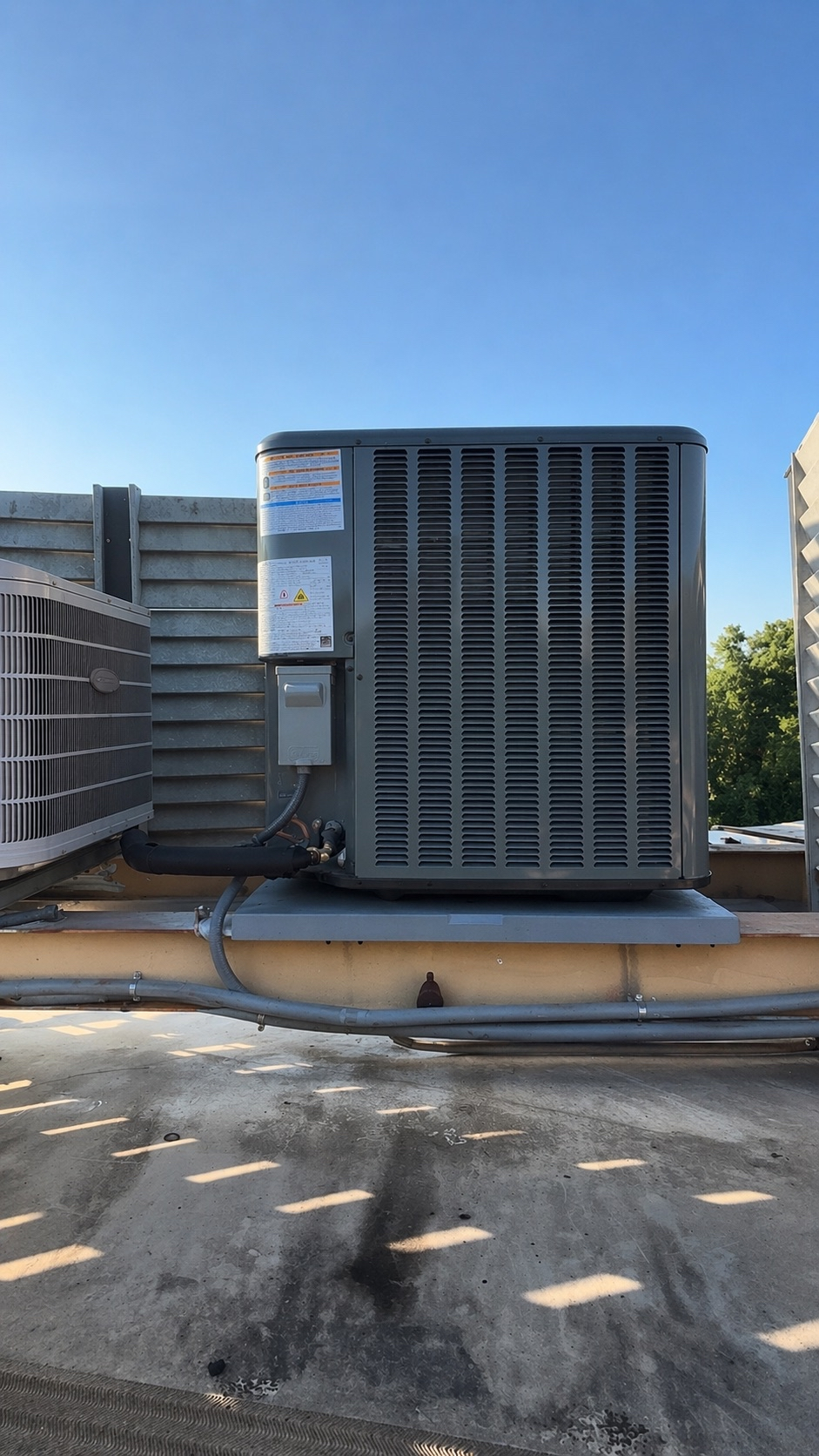 Rooftop HVAC condenser installation completed by C&S Heating & Cooling.